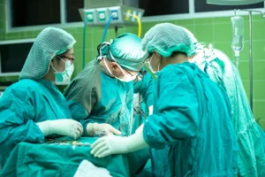 surgery, hospital, doctor, care, clinic, disease, emergency, group, team, health, help, infection, mask, medical, nurse, professional, people, physician, surgeon, medicine, scrubs, op, operation